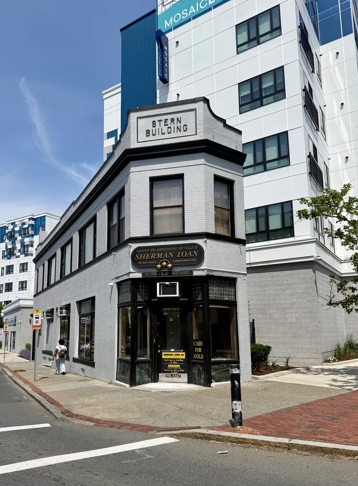 The same corner today — Sherman Loan Company in the Stern Building, beside the Mosaic apartments